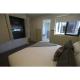 master bedroom in luxury balcony apartments - Carmel at Sorrento