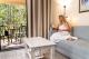 Relaxing in the living space of the villa
 - BNE Brisbane Airport to Tranquil Getaway on Obi Maleny Tranquil Getaways on Obi Maleny