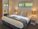 King bed in deluxe villa
 - BNE Brisbane Airport to Tranquil Getaway on Obi Maleny Tranquil Getaways on Obi Maleny